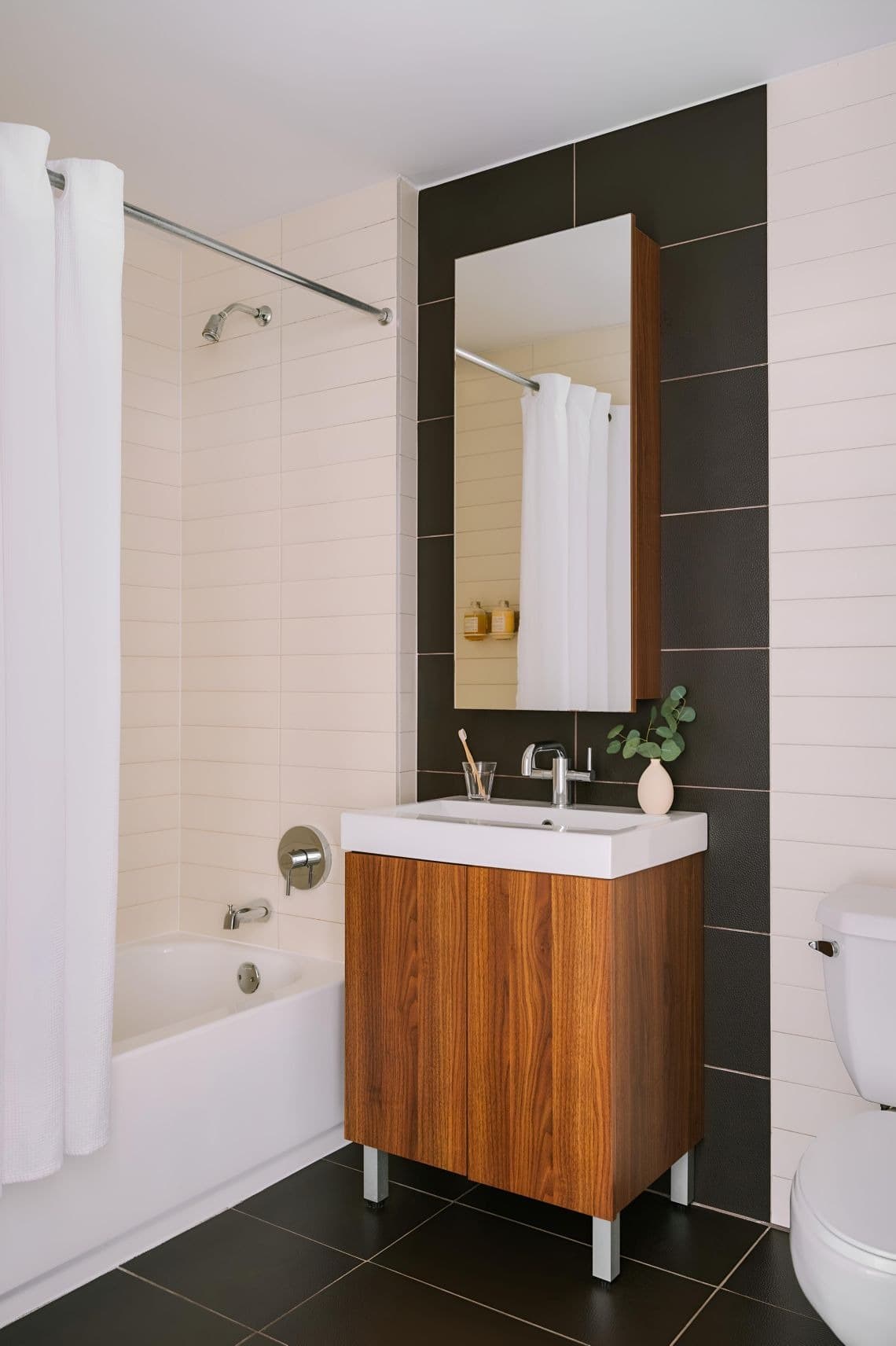 Guest room interior at Nester Finn Financial District with contemporary furnishings and city views