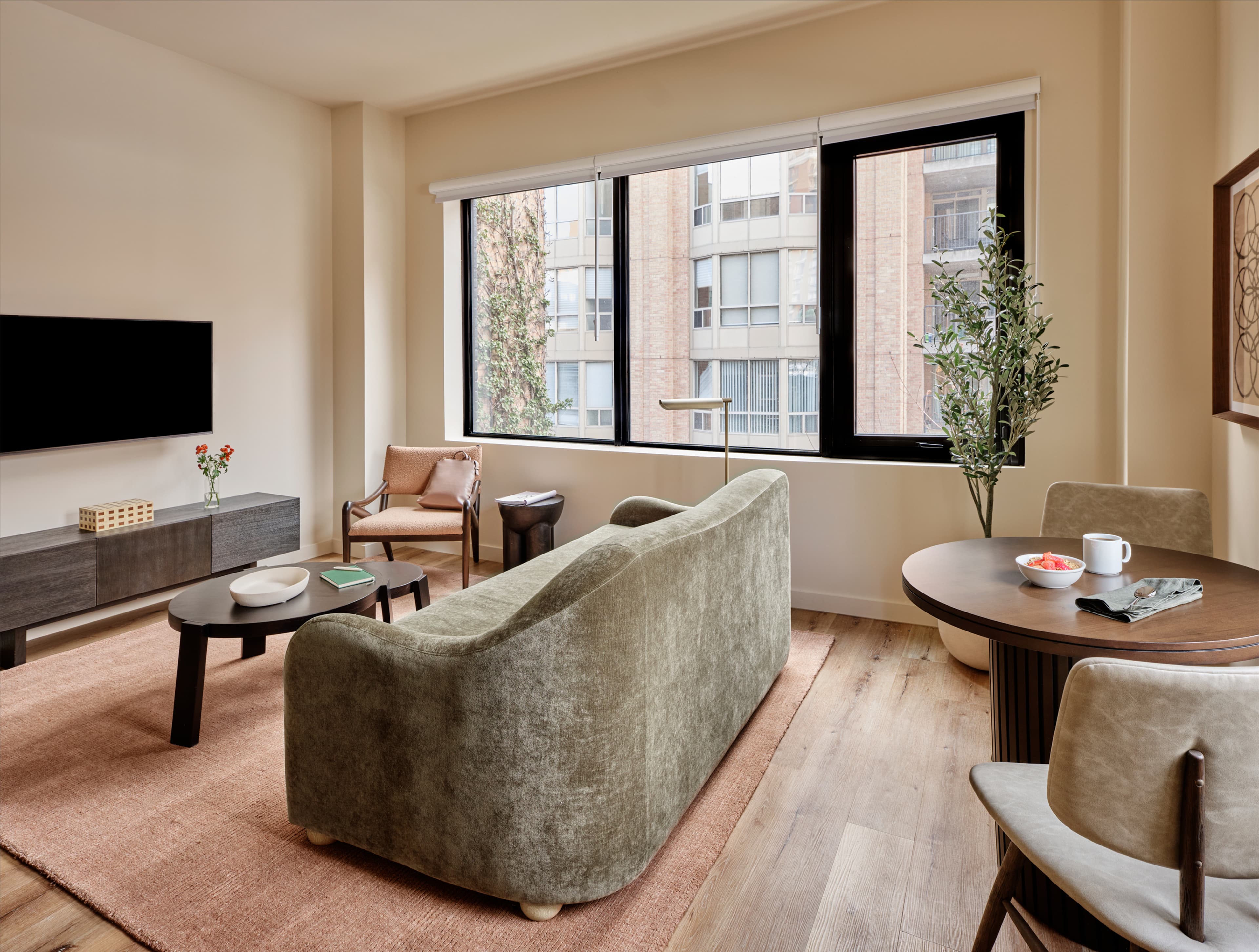 Spacious apartment living room with contemporary furnishings at Nester Finn St. Lawrence Market in St. Lawrence Market, Toronto